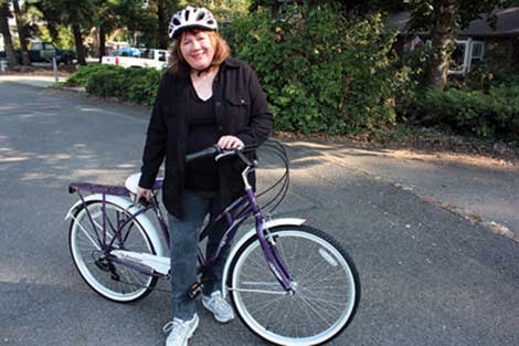 Barbara Sellers won a women's bicycle for $18.95 in bids on a penny auction site. (Ryan K. Harvey/courtesy photo)
