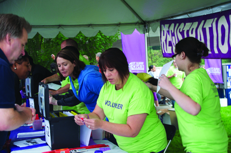 Volunteers helped participants get ready for the two-mile Walk to End Alzheimer's in Tacoma last year. The Alzheimer's Association will host the event again Sept. 13 in Tacoma, as well as another walk the next day in Bremerton.
