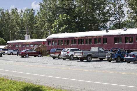 Motorists on their way to Mount Rainier can stop at railroad cars next to the highway in Elbe for dining at the Mount Rainier Railroad Dining Company.