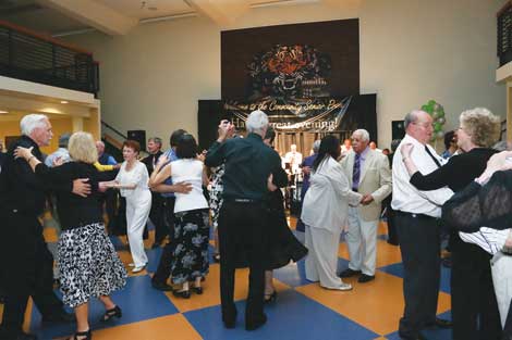Couples take a turn on the dance floor during last yearâ€™s Senior Prom. This yearâ€™s prom for folks 55 and older will be held May 30 at Clover Park Technical College in Lakewood.