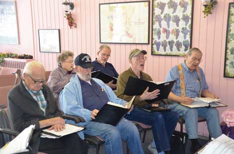 Patrick Lemon (third from left in front row), whose father was once a Memorie Singer, likes “that we are bringing music to people who really enjoy hearing it.†Lemon is seen rehearsing with (front, from left) 96-year-old Bill Parks, Cliff Chapman and Rudy Horst, and (second row, from left) Phyllis Horst and Tony Baskett. (Joan Cronk/Senior Scene)