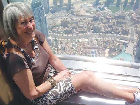 Linda Finch at the top of Burj Khalifa, the tallest building in the world, in Dubai.