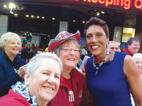 Tour group members Mary Jean King and Jeanette Harris posed outside the â€œGood Miorning Americaâ€ television show studio in New York City with host Robin Roberts.