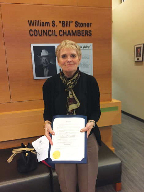Linda Henry, president of the board of Puyallup Area Aging in Community Committee, accepted a City of Puyallup proclamation declaring the third week of October as Aging in Place Week.  Joan Cronk/for Senior Scene) 