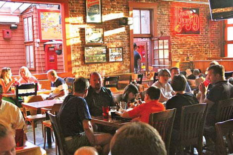 Brick walls and wood floors add warmth and charm to the dining environment of Engine House Number 9.